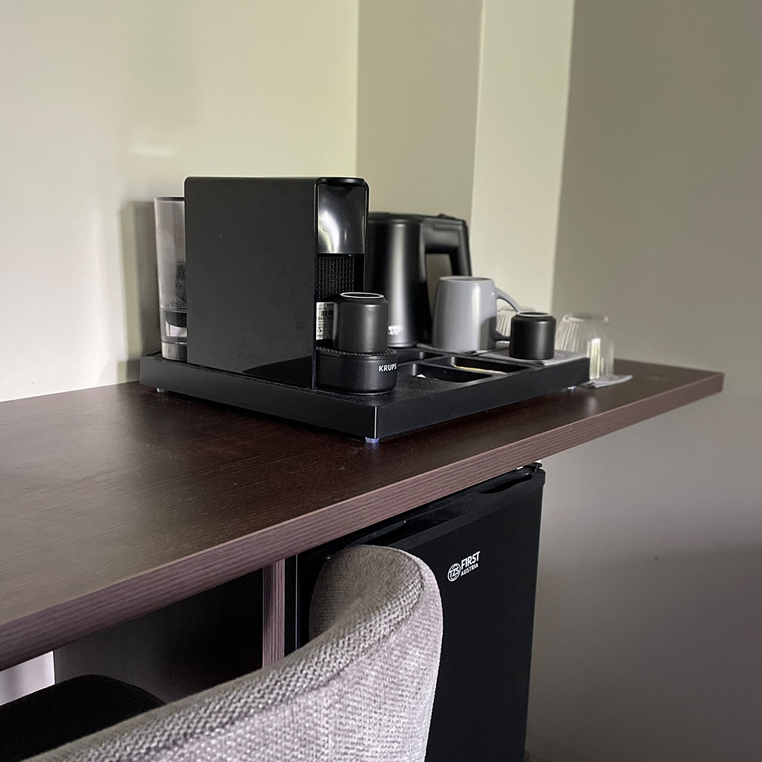 View of the coffee machine on a shelf in the Hotel Walter's at Goetheplatz